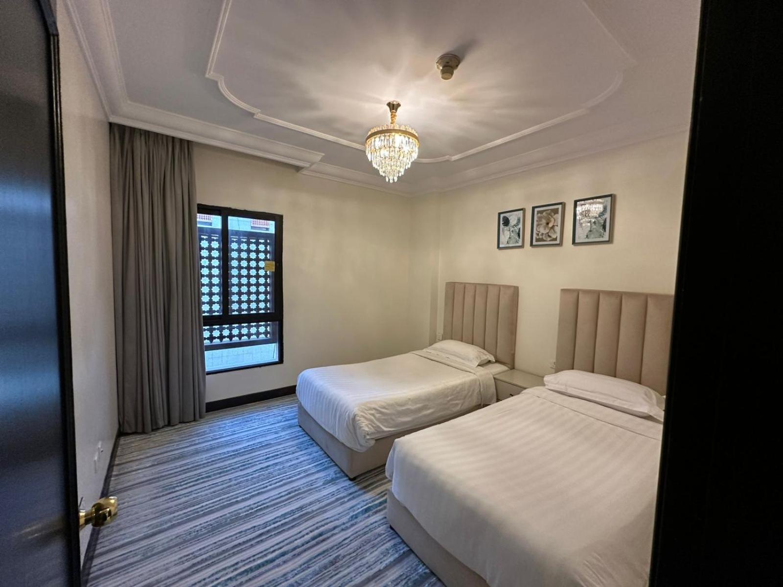 Zad Al Eman Suites Hotels Medína Pokoj fotografie